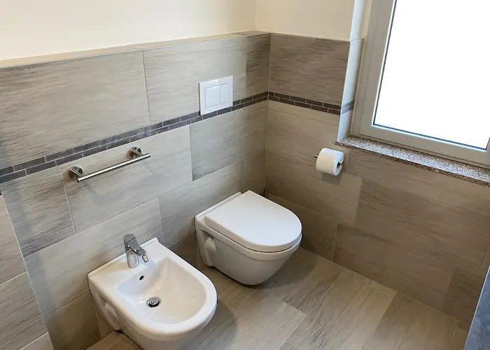 Alojamento de Acomodação e Pequeno-almoço Siclari B&b-rooms&suite