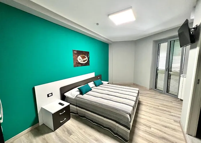 Alojamento de Acomodação e Pequeno-almoço Siclari B&b-rooms&suite